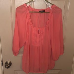 Salmon pink colored blouse
